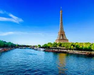 View of the Eiffel Tower and river Seine on a sunny day in Paris, France